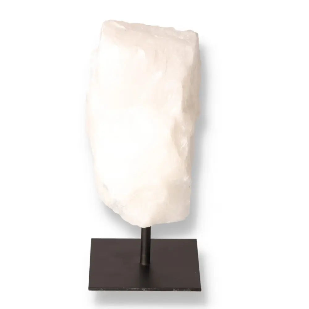 Cut Milky Quartz on Metal Stand by Sylvia Crystals, showcasing its ethereal cloudy allure and luxury craftsmanship, ideal for elegant decor.