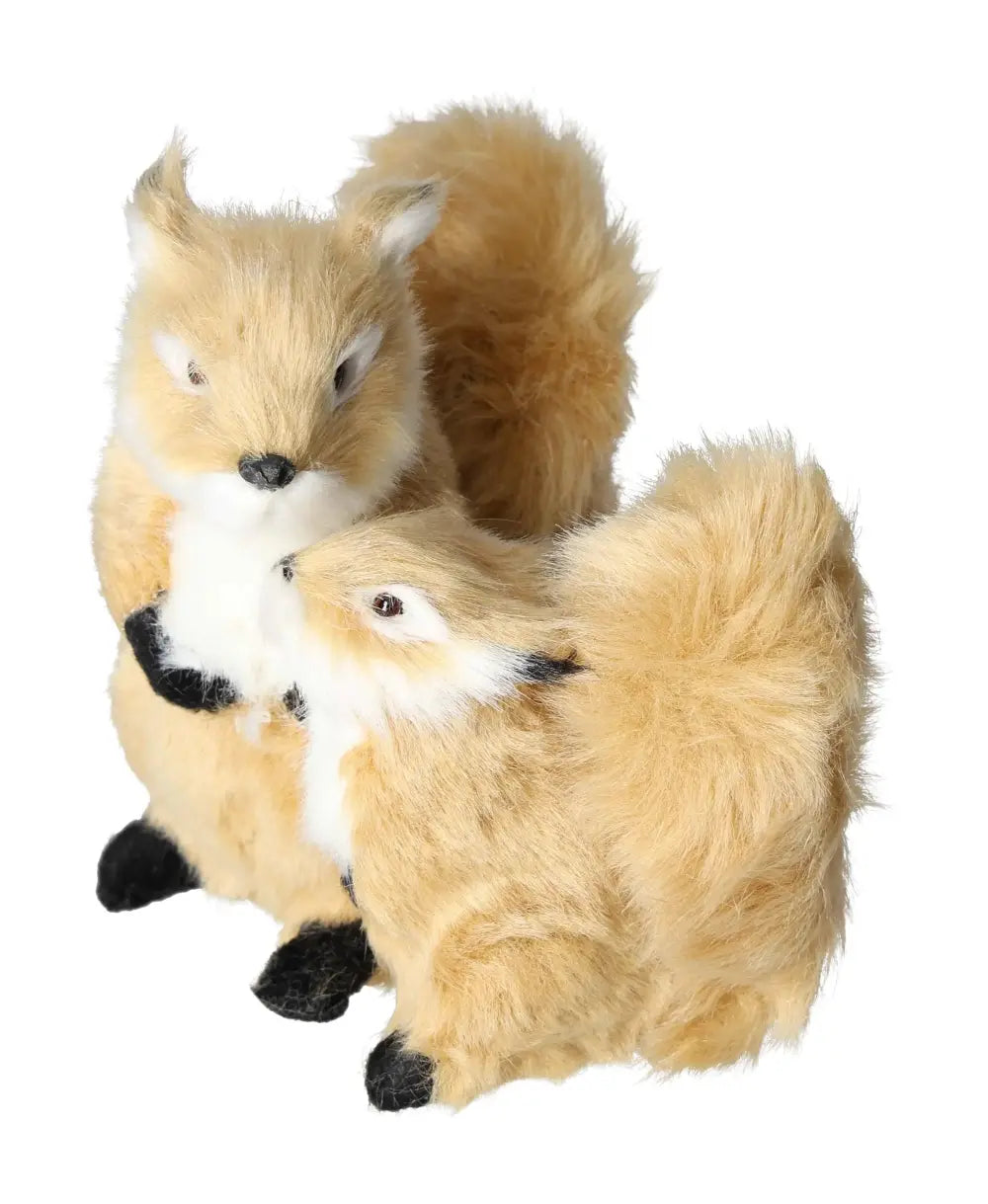 Pair of beige decorative squirrel figurines with lifelike fur, embodying serenity and nature's spirituality for home decor.