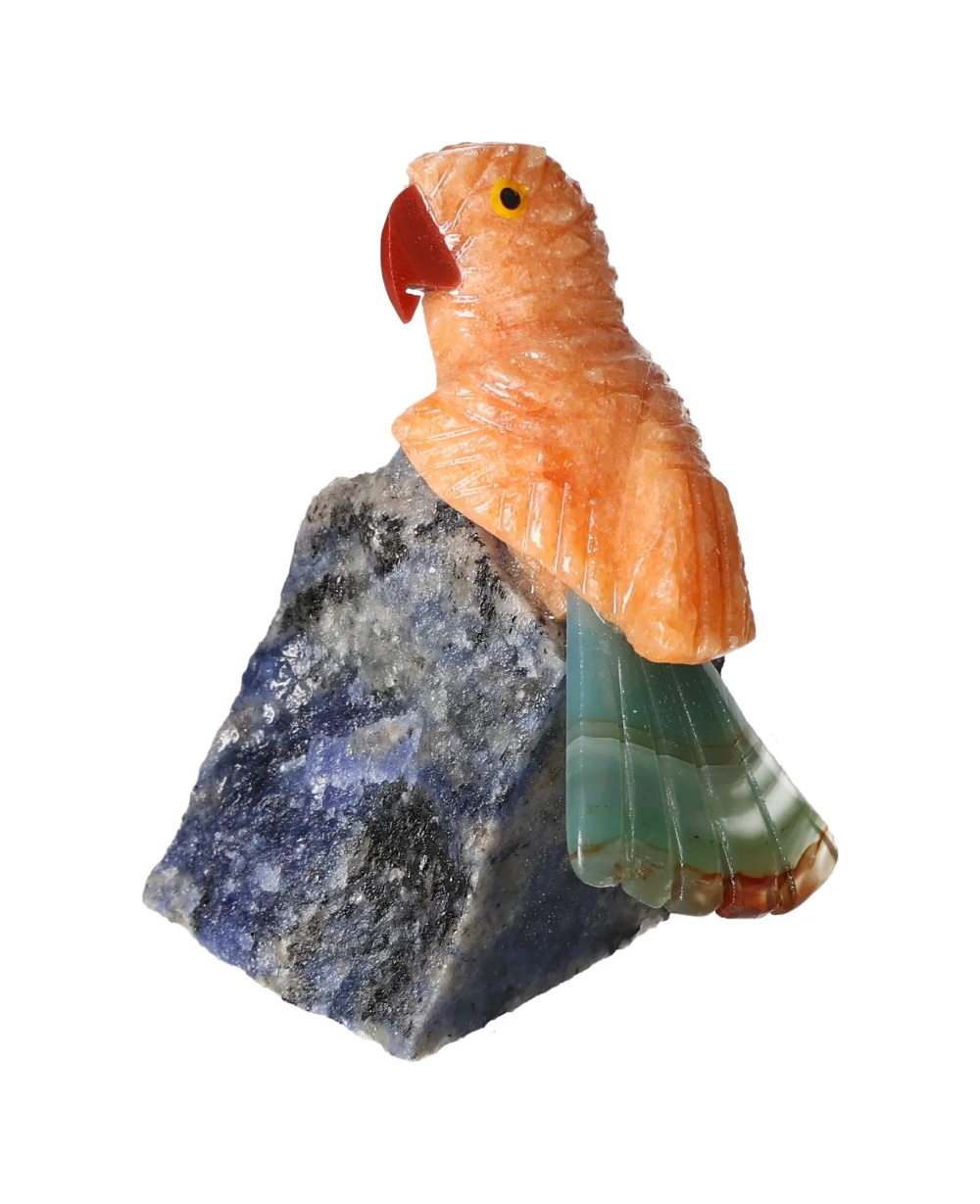 Orchid Calcite Parrot On Sodalite 636360 sculpture, enhancing creativity and clear thinking with vibrant colors on natural stone.