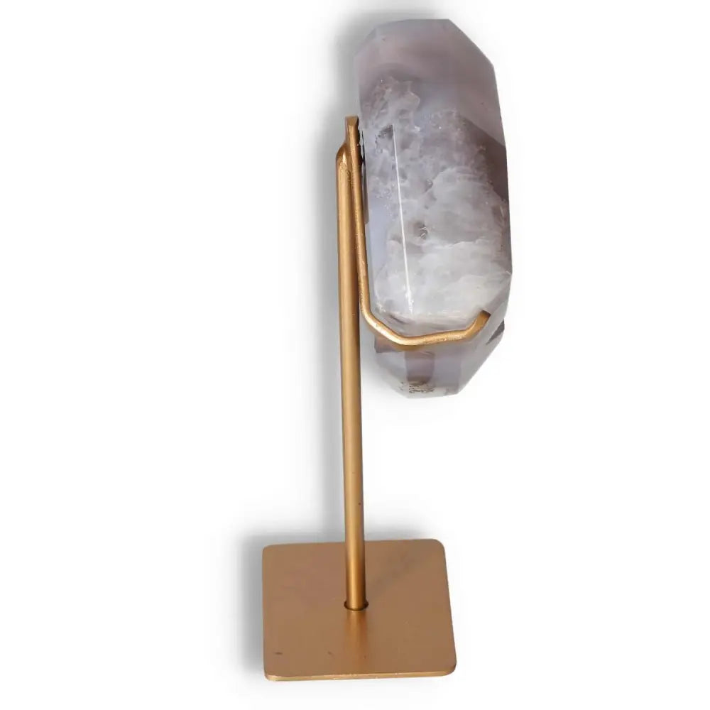 Agate decoration with stand, showcasing natural patterns and elegant translucency, perfect for bringing nature's artistry into your space.
