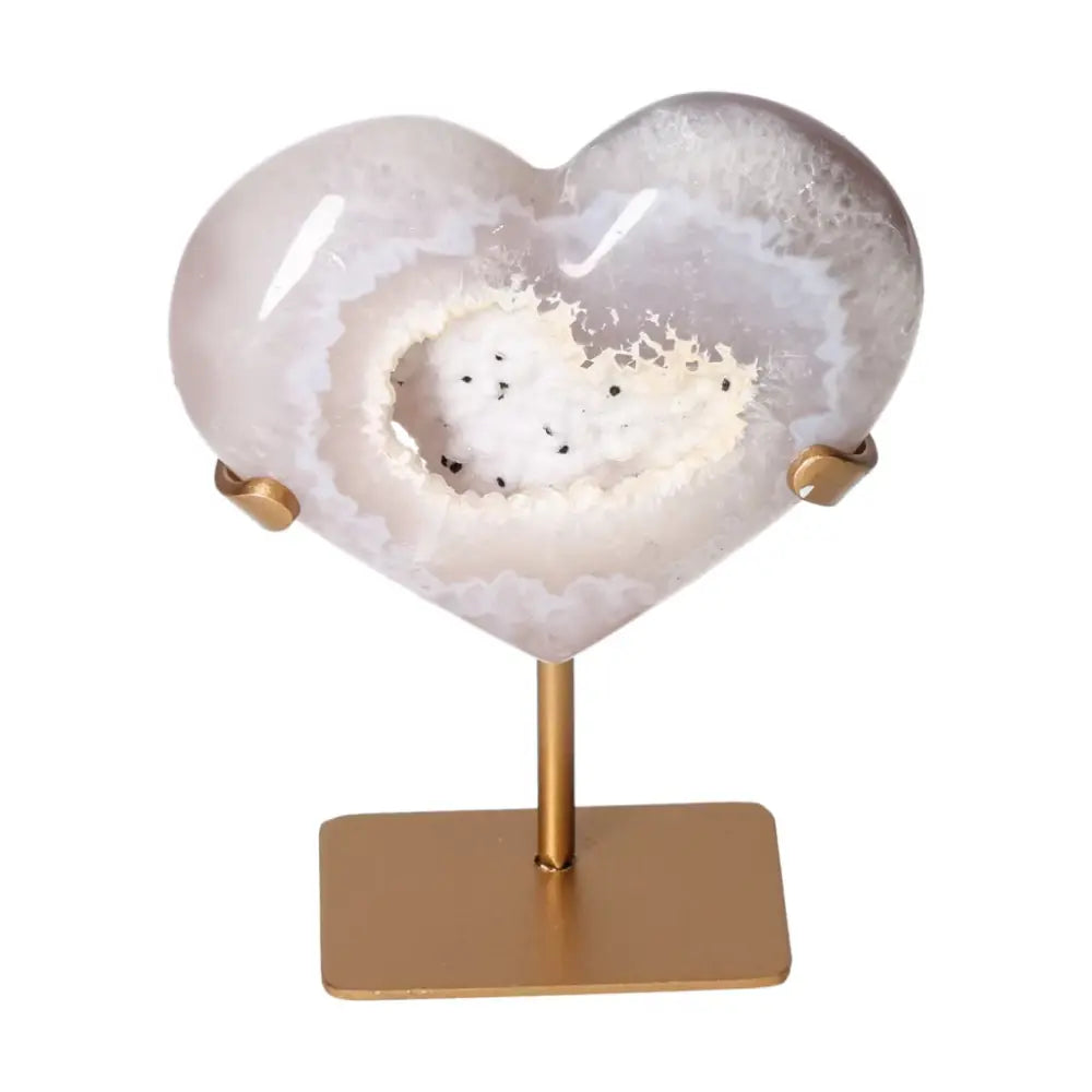 Alt Tag: Exquisite Agate Heart on stand, by Sylvia Crystals, showcasing unique patterns and energy harmonizing properties for elegance and balance.