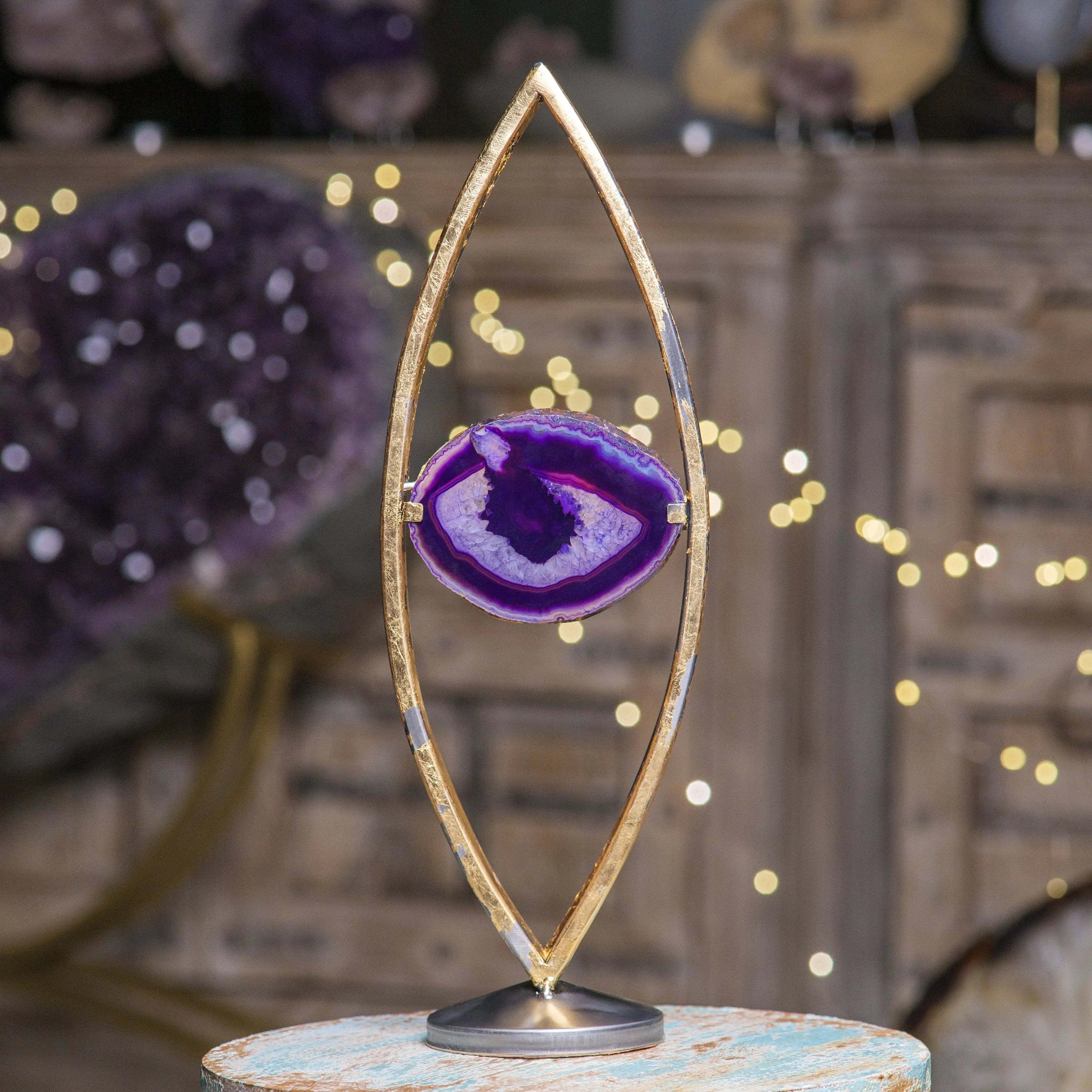 Elegant Agate Lamp 6 featuring a purple agate stone centerpiece in a gold frame, emitting a serene and ambient glow.