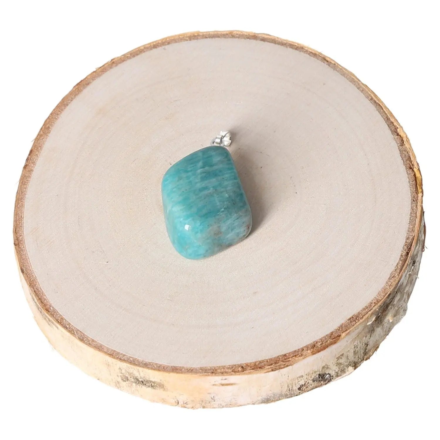 Amazonite AA Tumbled Pendant featuring vibrant hues on a wooden slice display