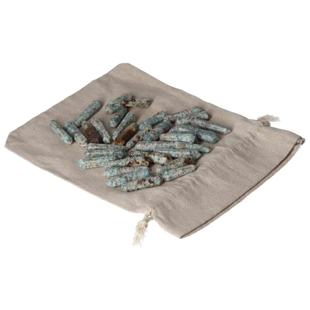 Amazonite Small Sticks on beige pouch, promoting calming and balancing effects as a stone of harmony.