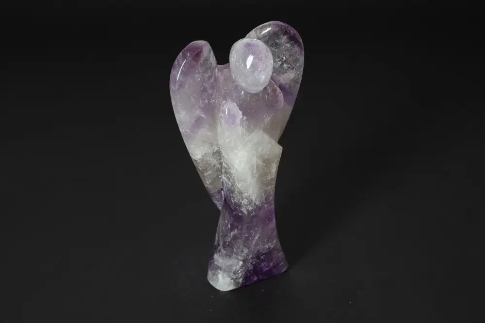 Angel-shaped 15 cm amethyst crystal sculpture promoting stress reduction and emotional stability with energy enhancement properties.