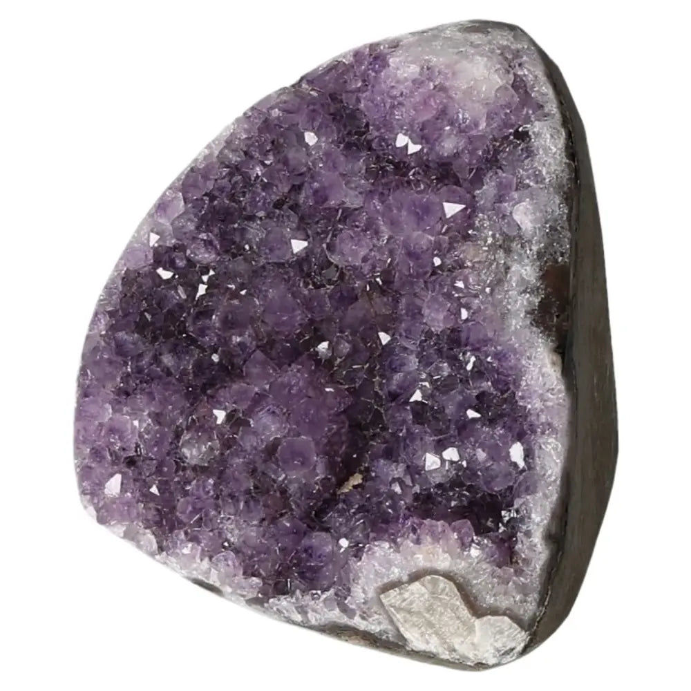 Amethyst Cut Base Geode from Sylvia Crystals with deep purple hues, ideal for stress reduction and energy enhancement.