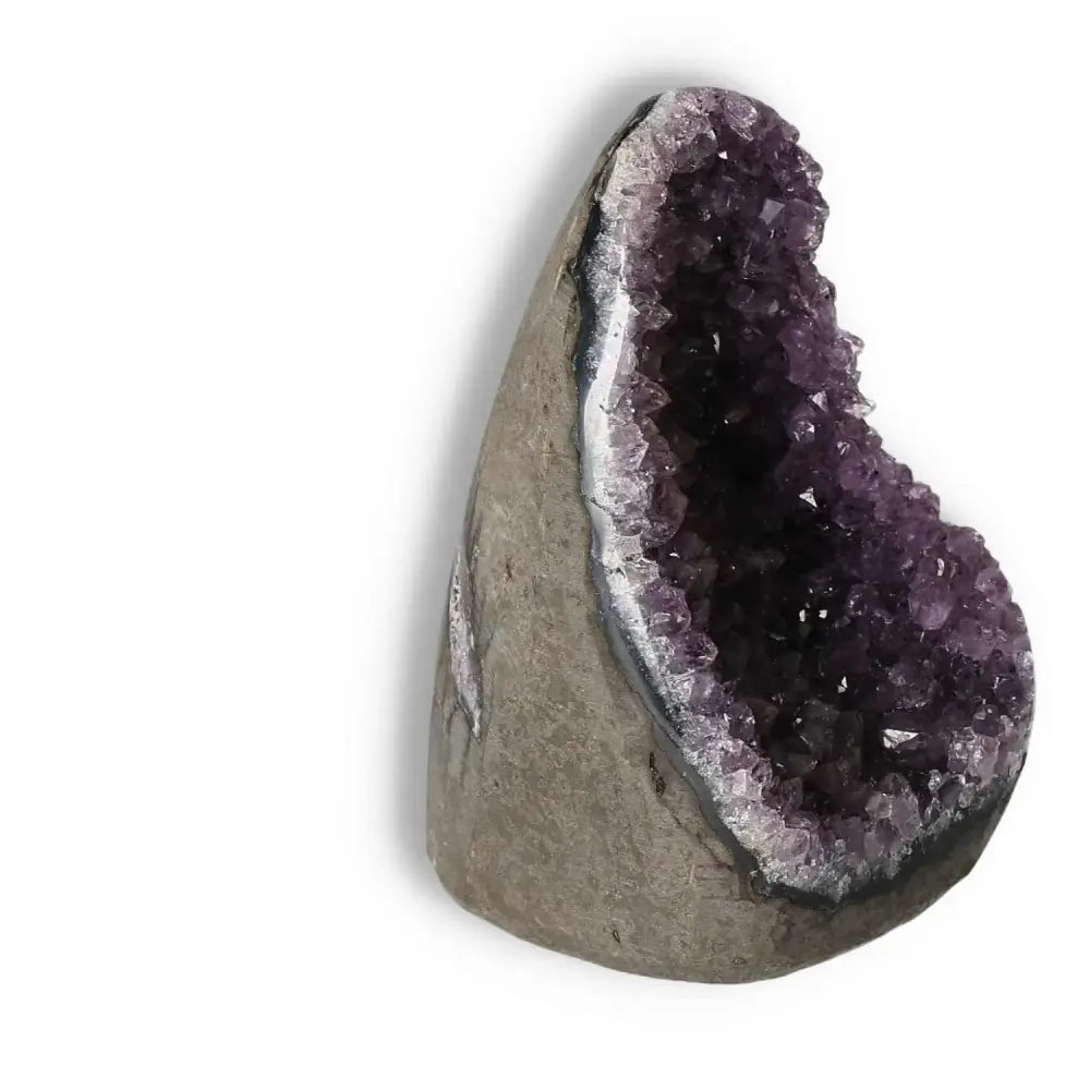 Amethyst Cut Base Geode by Sylvia Crystals, premium crystal known for stress relief and spiritual energy enhancement.