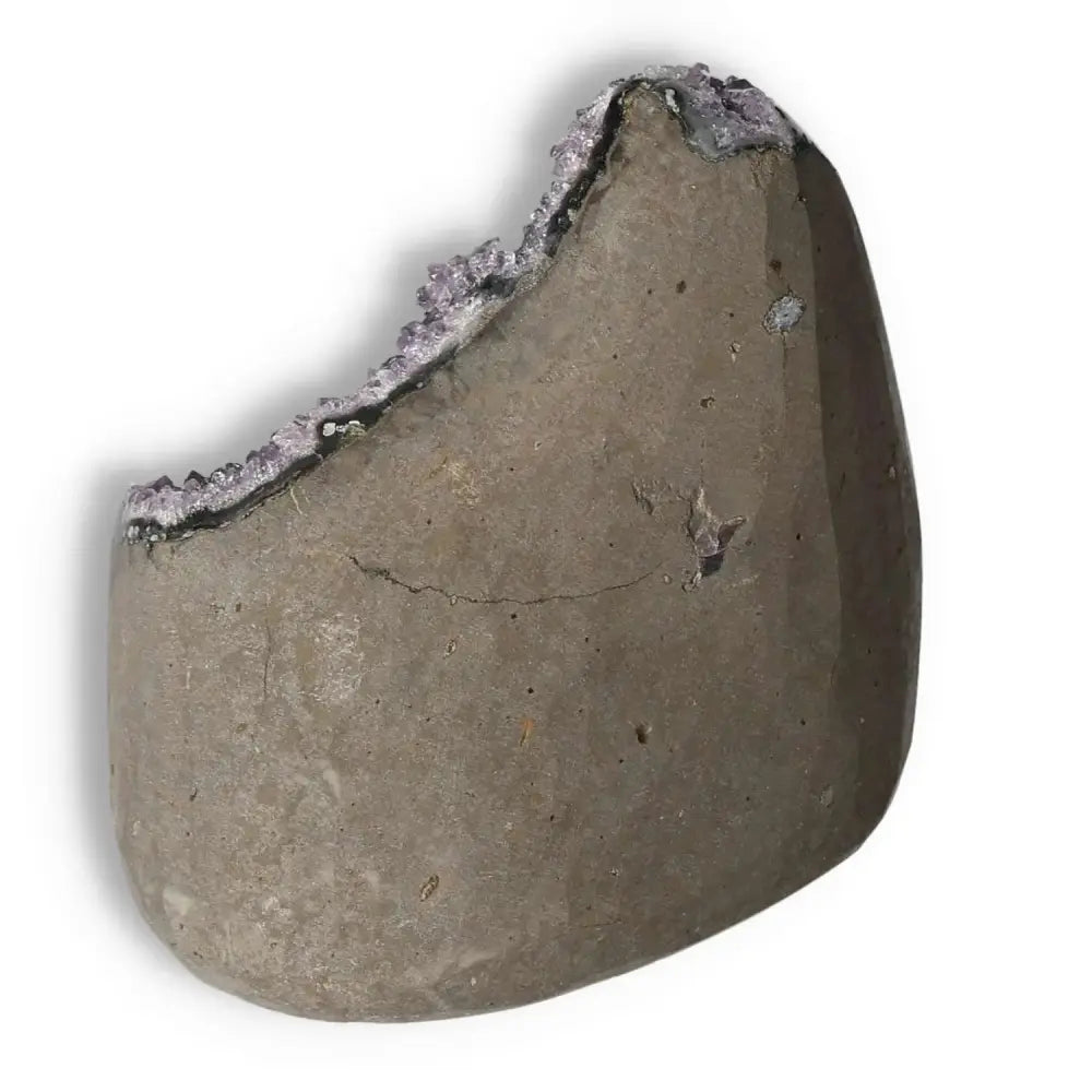 Amethyst Cut Base Geode from Sylvia Crystals, known for stress reduction and energy boost, enhancing concentration and emotional stability.