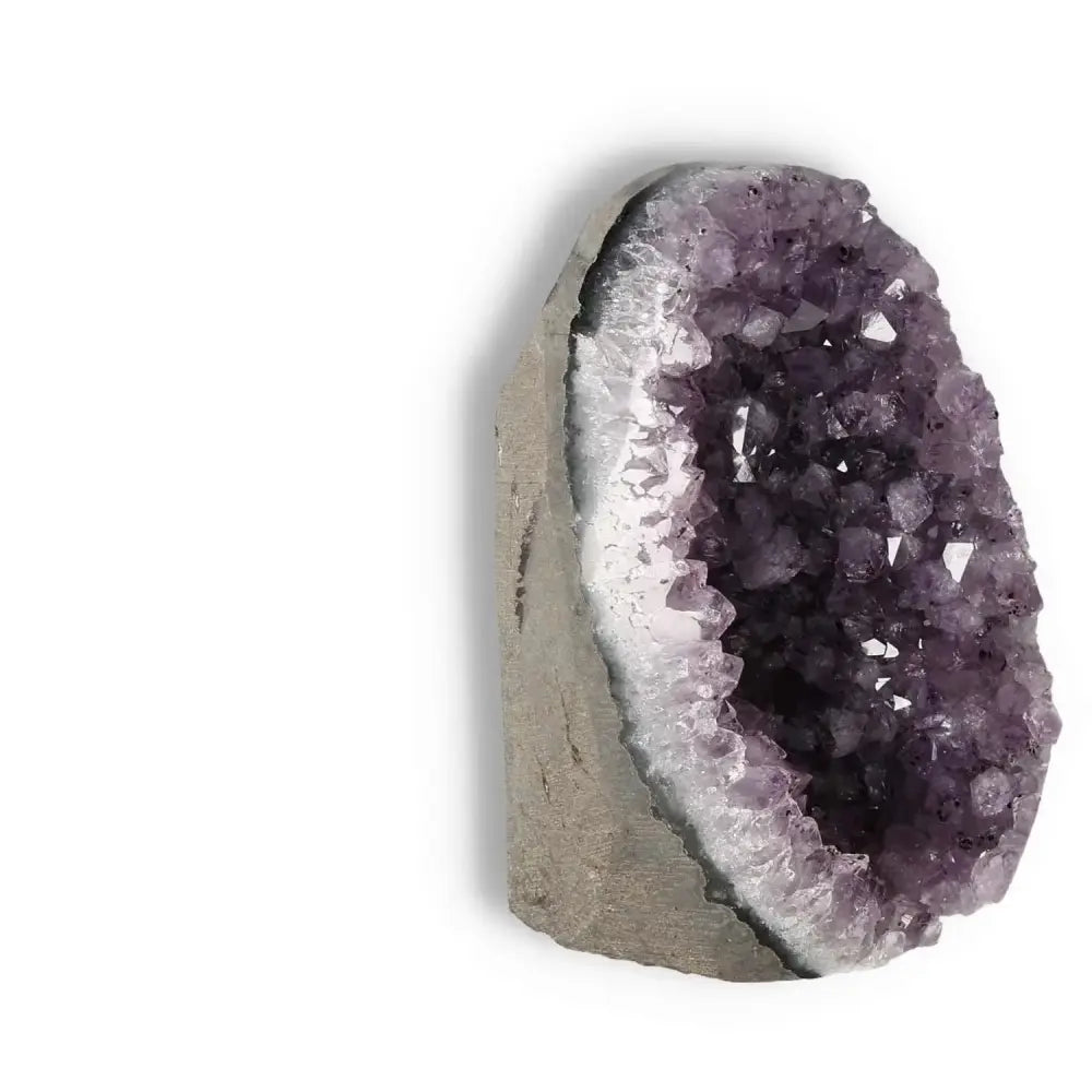 Amethyst Cut Base Geode from Sylvia Crystals, featuring vibrant purple hues and premium craftsmanship for spiritual elegance.