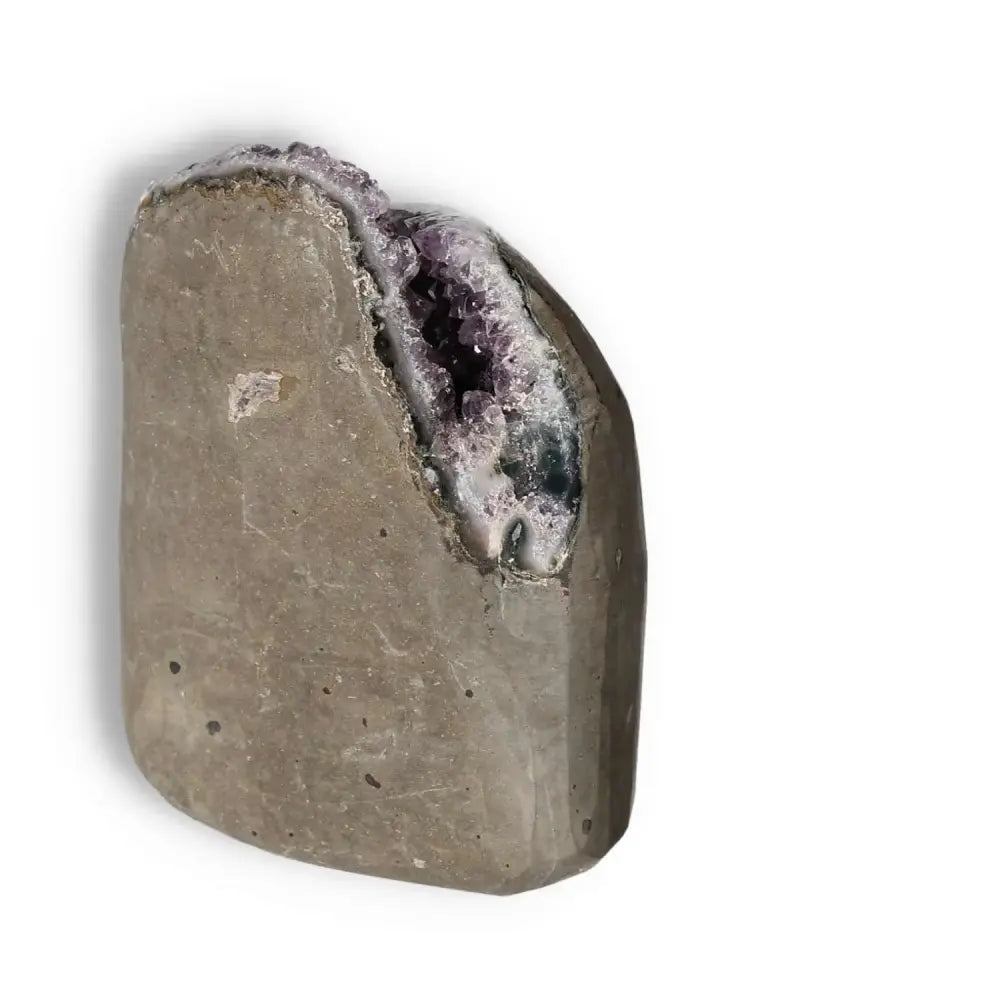 Premium Amethyst Cut Base Geode from Sylvia Crystals, showcasing stunning purple hues and calming energy properties.