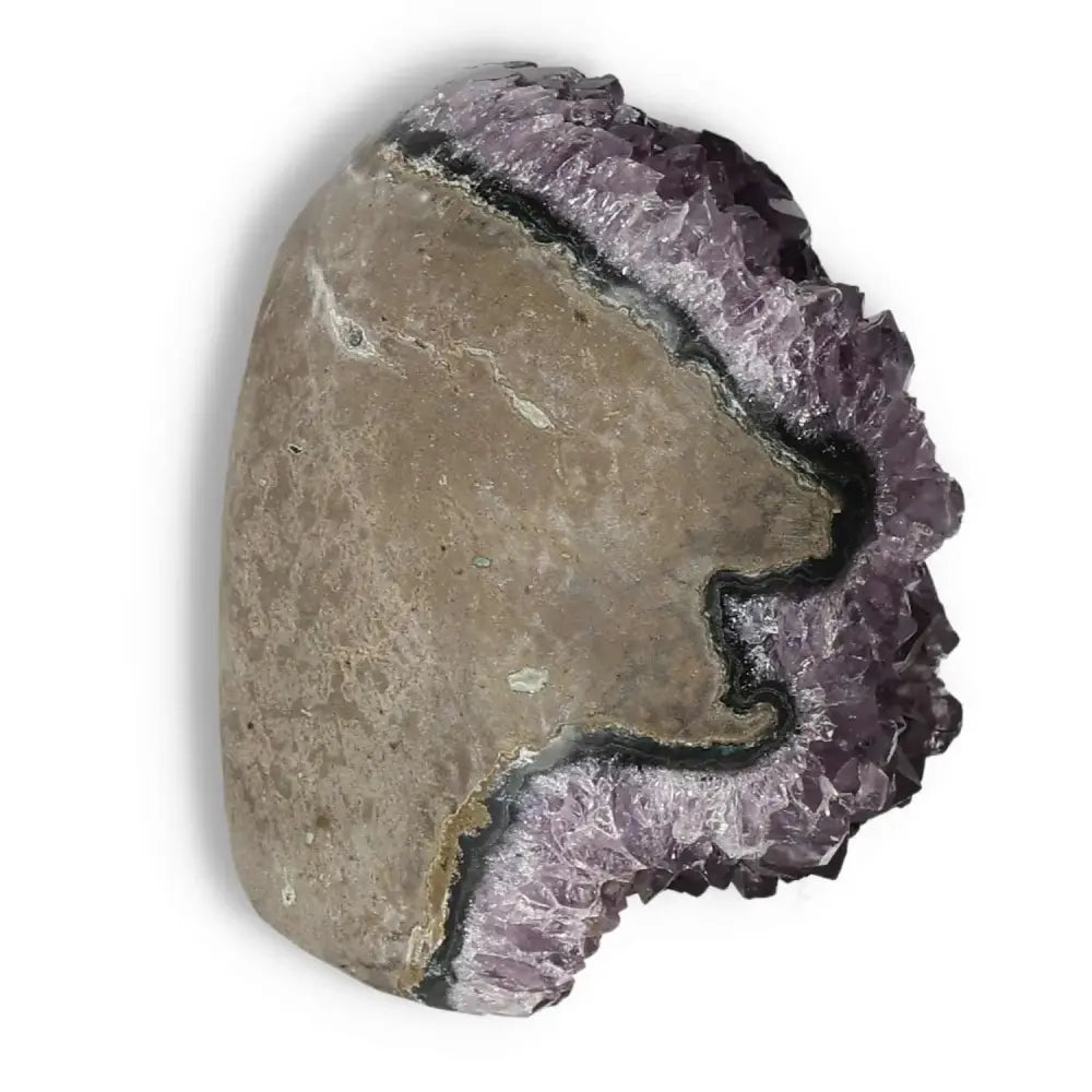 Amethyst Cut Base Geode featuring a raw crystalline structure, ideal for stress relief and enhancing concentration from Sylvia Crystals