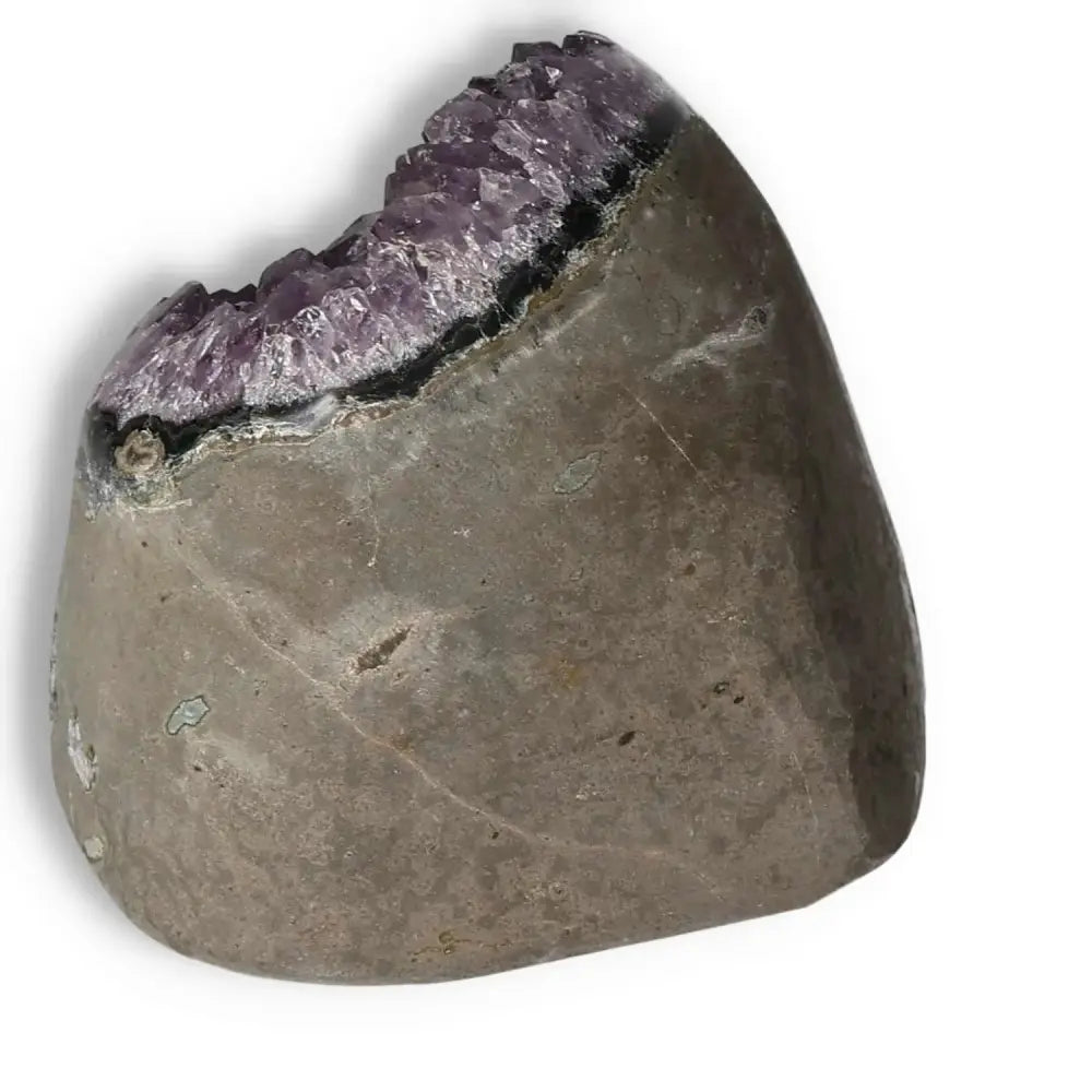 Amethyst Cut Base Geode from Sylvia Crystals, showcasing shimmering purple crystals and smooth stone base for energy and concentration.