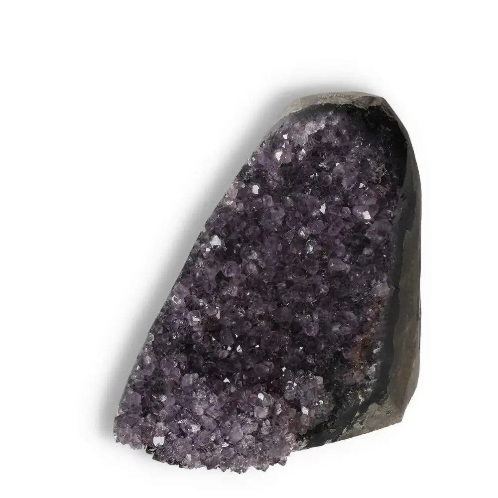 Amethyst Cut Base Geode crystal with purple hues, renowned for stress reduction and energy enhancement from Sylvia Crystals.