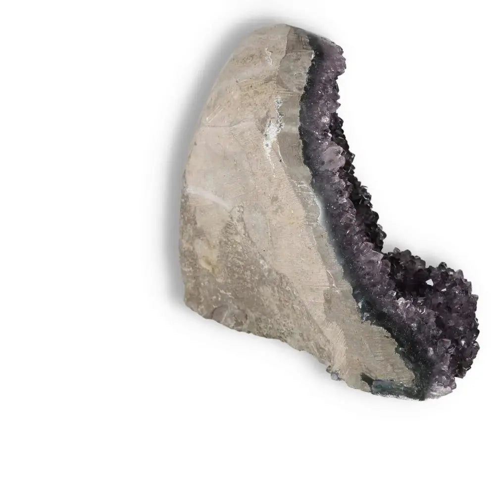 Amethyst Cut Base Geode by Sylvia Crystals, enhancing energy, focus, and emotional balance with luxury and prestige.