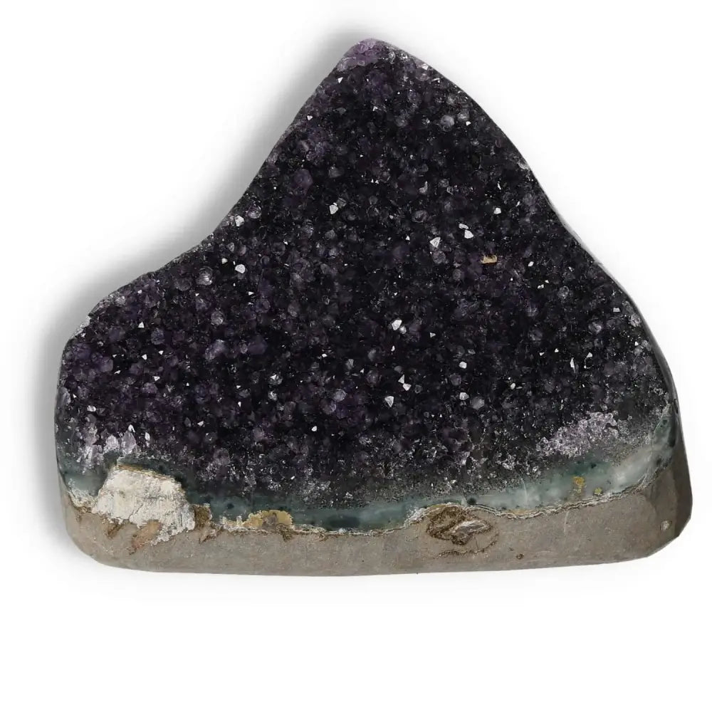 Amethyst Cut Base Geode from Sylvia Crystals showcasing luxurious purple crystals for stress relief and energy enhancement.