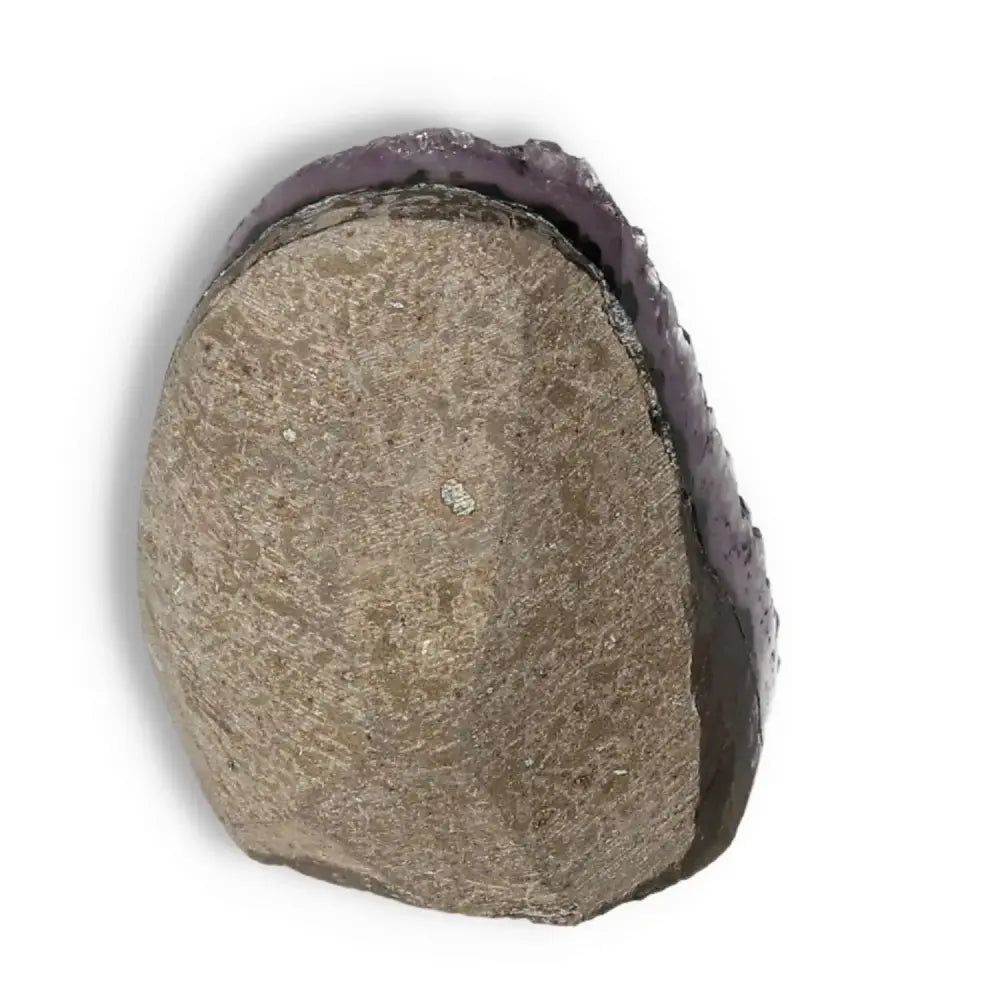 Amethyst Cut Base Geode by Sylvia Crystals for stress reduction and energy enhancement, showcasing its exquisite natural beauty.