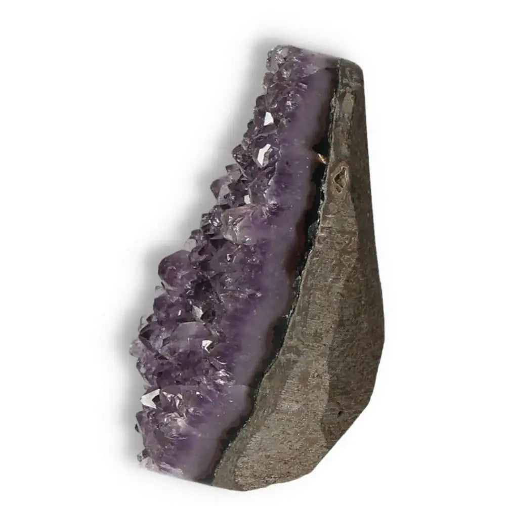 Amethyst Cut Base Geode by Sylvia Crystals; promotes emotional stability and energy enhancement.