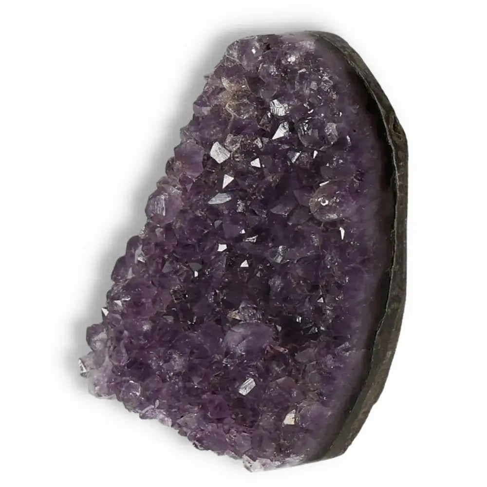 Premium Amethyst Cut Base Geode by Sylvia Crystals, known for stress reduction and energy boosting properties; elegant decor.