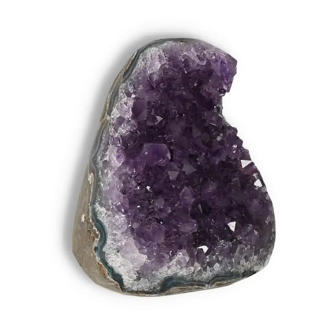 Amethyst Cut Base Geode with stunning violet hues, premium quality from Sylvia Crystals, enhancing spiritual depth and elegance.