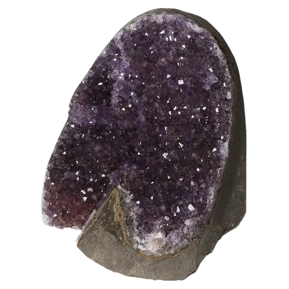 Elegant Amethyst Cut Base Geode known for stress relief and concentration, from Sylvia Crystals, offering luxury and spirituality.