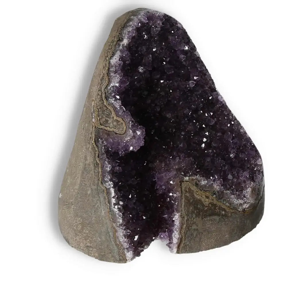 Stunning Amethyst Cut Base Geode with deep purple crystals, perfect for enhancing decor and promoting relaxation.