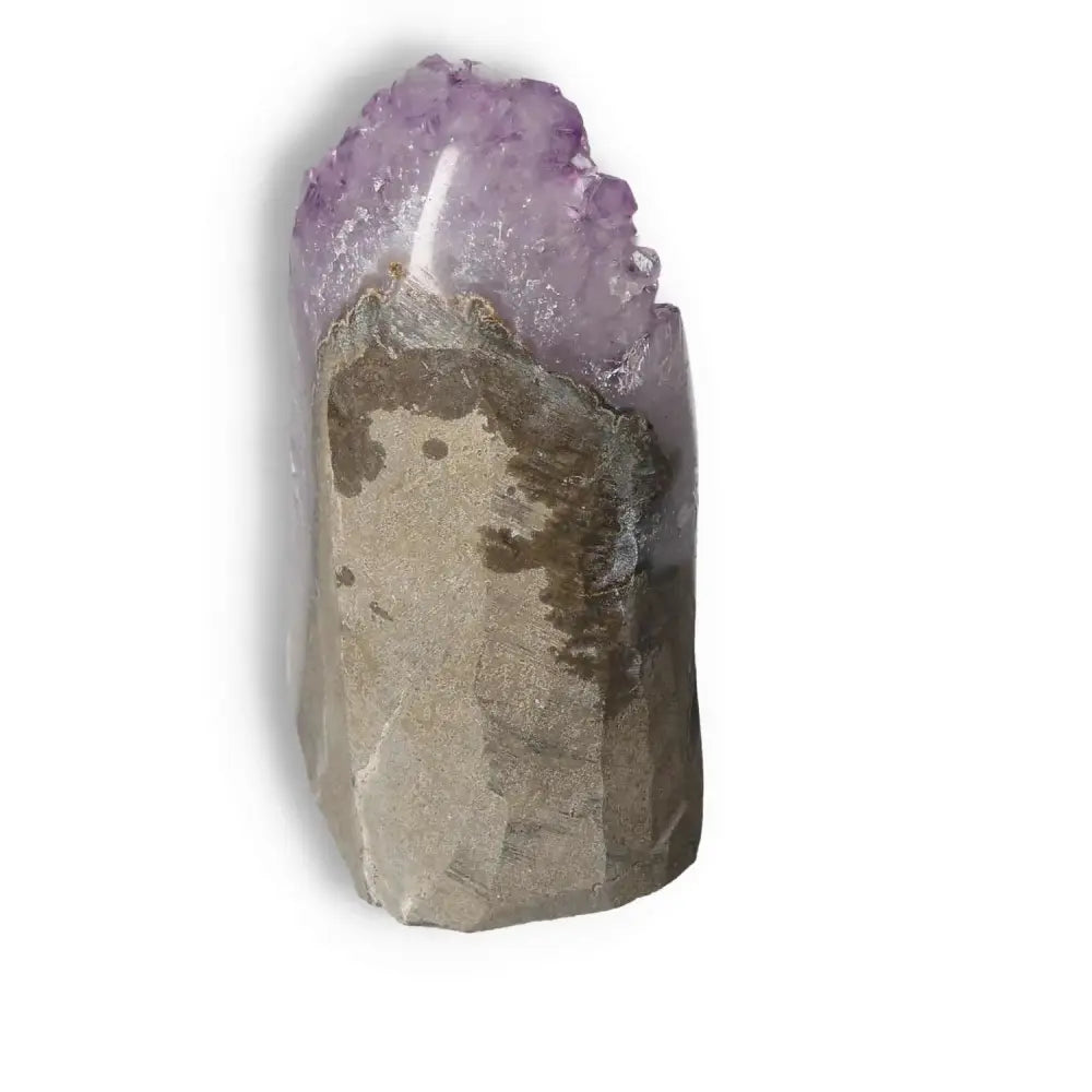 Amethyst Cut Base Geode by Sylvia Crystals, enhancing tranquility and concentration with its elegant purple hues.