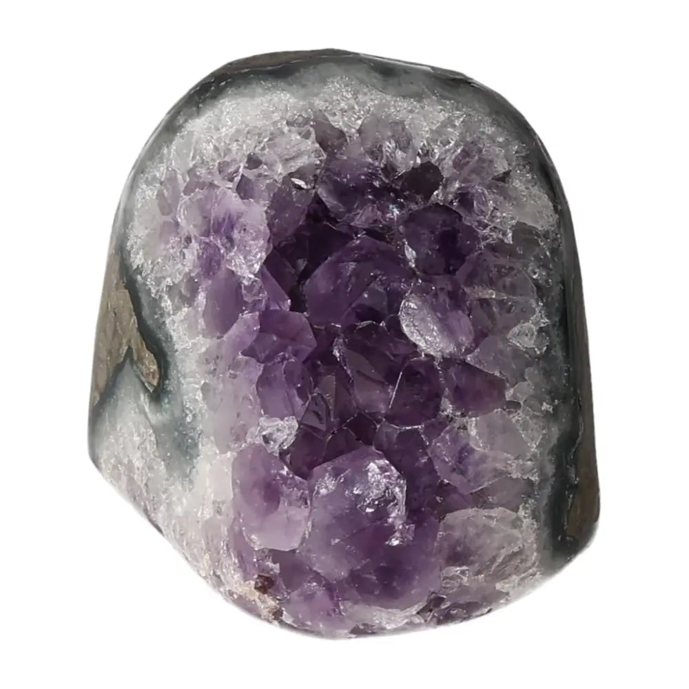 Amethyst Cut Base Geode from Sylvia Crystals showcasing luxurious purple crystals and spiritual energy.