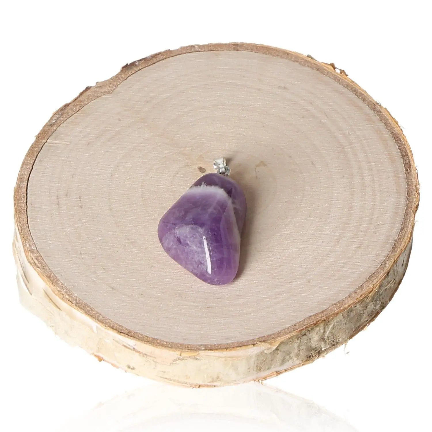 Amethyst Malawi Tumbled Pendant on Wooden Base, showcasing deep purple hues and spiritual symbolism, perfect for elegance and tranquility.