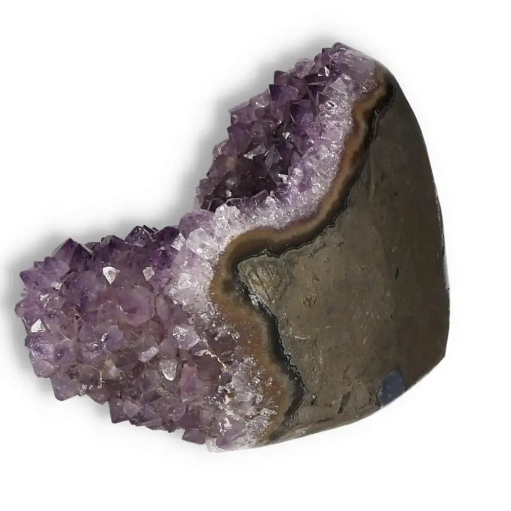 Amethyst cut base geode with purple crystals from Sylvia Crystals offering tranquility and luxury.