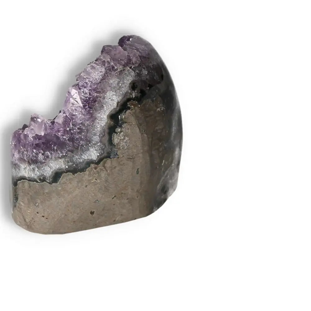 Amethyst cut base geode with deep purple hues, valuable for stress reduction and concentration, from Sylvia Crystals.