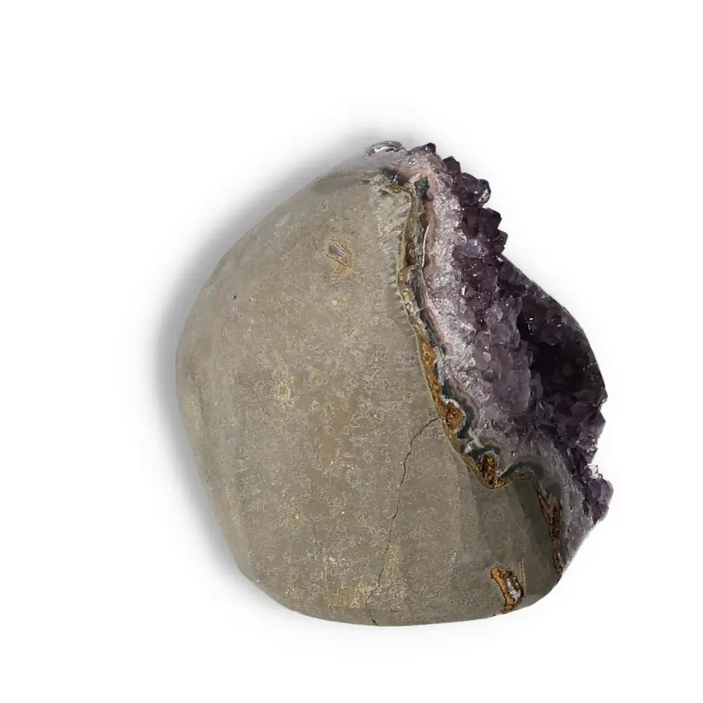 Amethyst cut base geode with violet crystals from Sylvia Crystals, ideal for decor and stress relief.