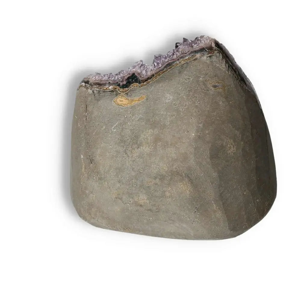 Amethyst cut base geode with rich violet hues from Sylvia Crystals; enhances decor and offers stress relief and emotional balance.