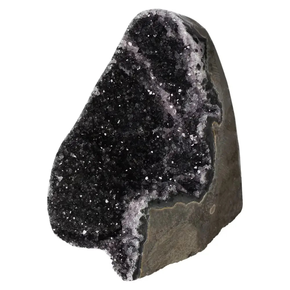 Amethyst cut base geode from Sylvia Crystals, showcasing deep purple hues and shimmering texture, ideal for stress relief and mental clarity.