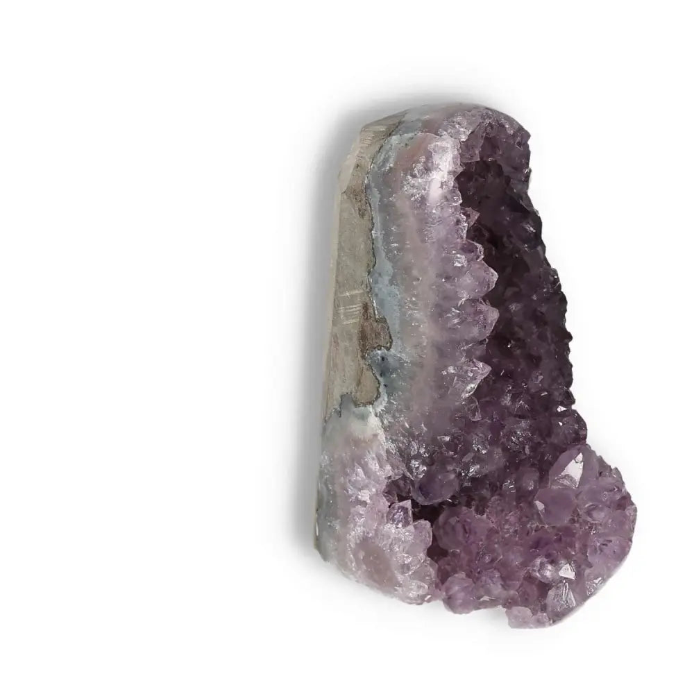 Amethyst cut base geode with deep purple tones, showcasing crystalline beauty for calm and focus, from Sylvia Crystals.