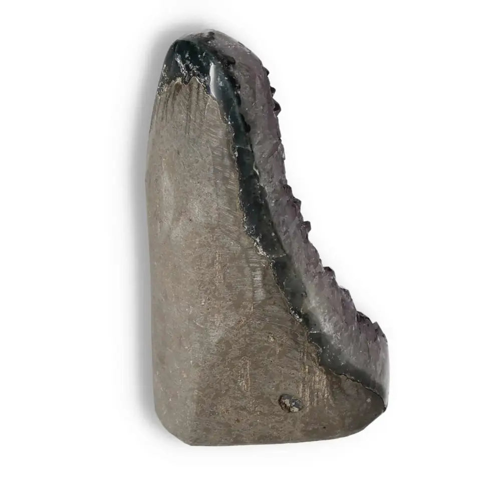 Amethyst cut base geode from Sylvia Crystals, showcasing natural beauty and spiritual resonance, side view.