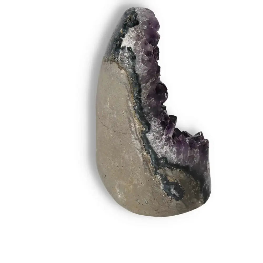 Amethyst cut base geode from Sylvia Crystals, known for enhancing well-being, stress relief, and concentration.