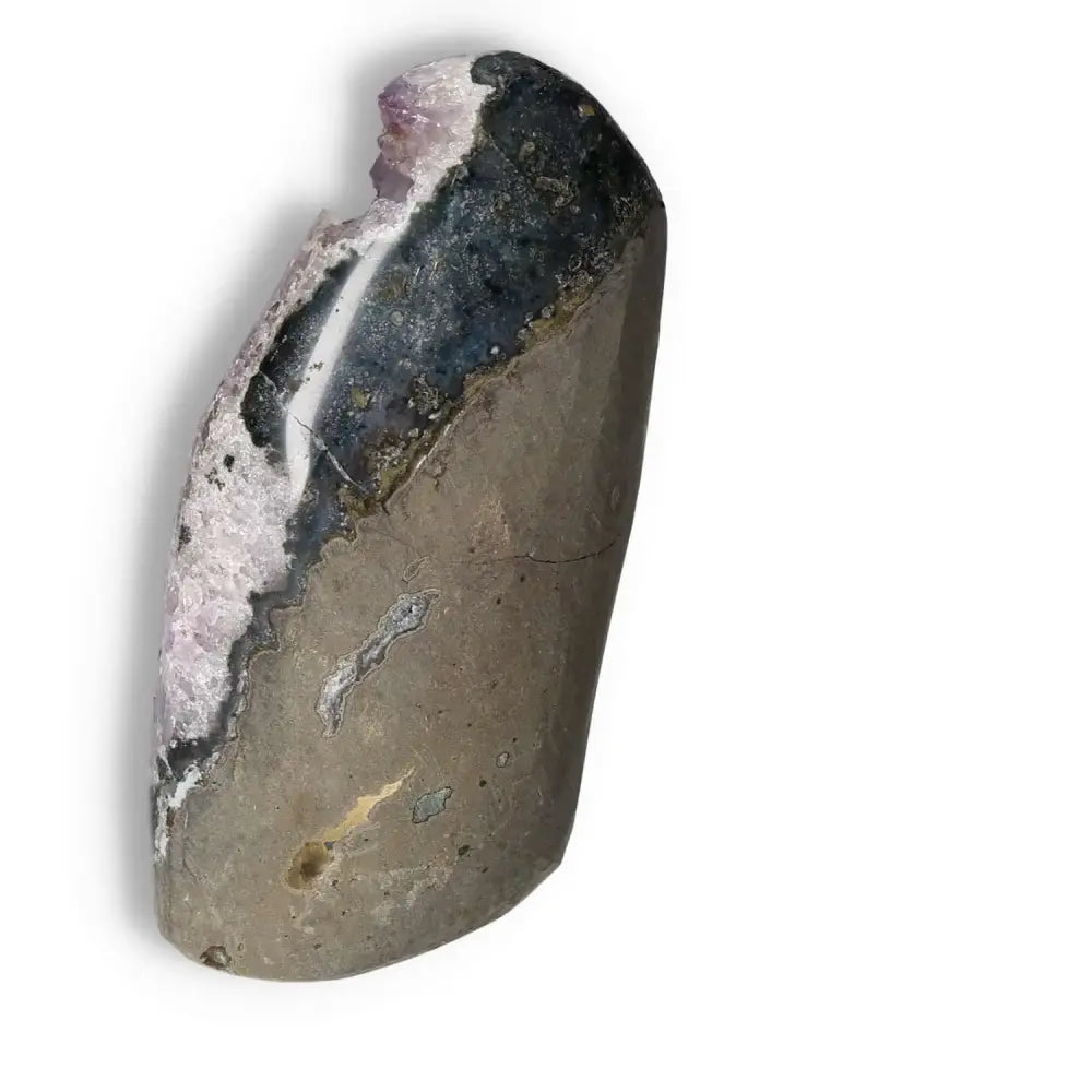 Amethyst cut base geode from Sylvia Crystals, offering spiritual serenity and emotional stability with luxurious design.