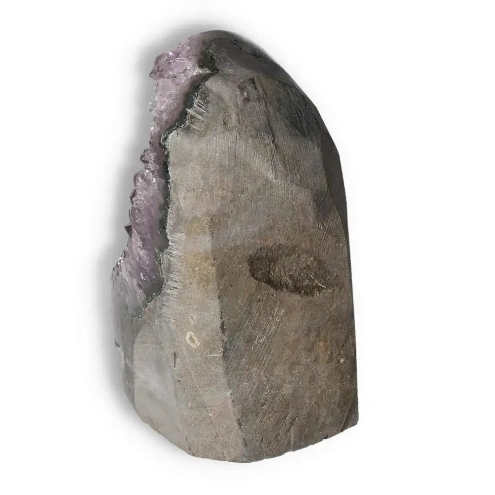 Amethyst cut base geode from Sylvia Crystals, known for enhancing emotional stability and stress relief.