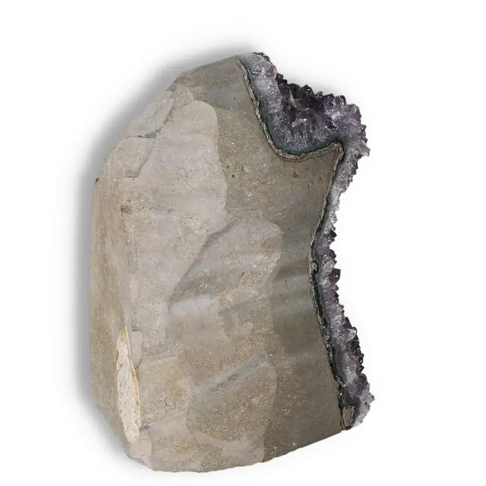 Amethyst cut base geode from Sylvia Crystals showcasing natural beauty and luxury with spiritual and metaphysical benefits.