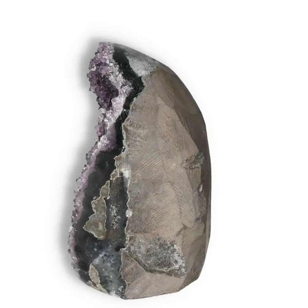Exquisite Amethyst cut base geode from Sylvia Crystals; a blend of luxury and tranquility for spiritual wellness.