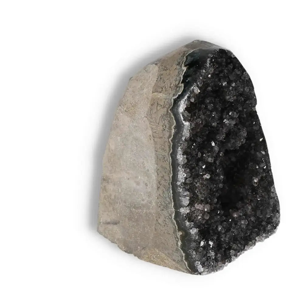 Amethyst cut base geode from Sylvia Crystals, showcasing sparkling mineral formations and natural beauty.