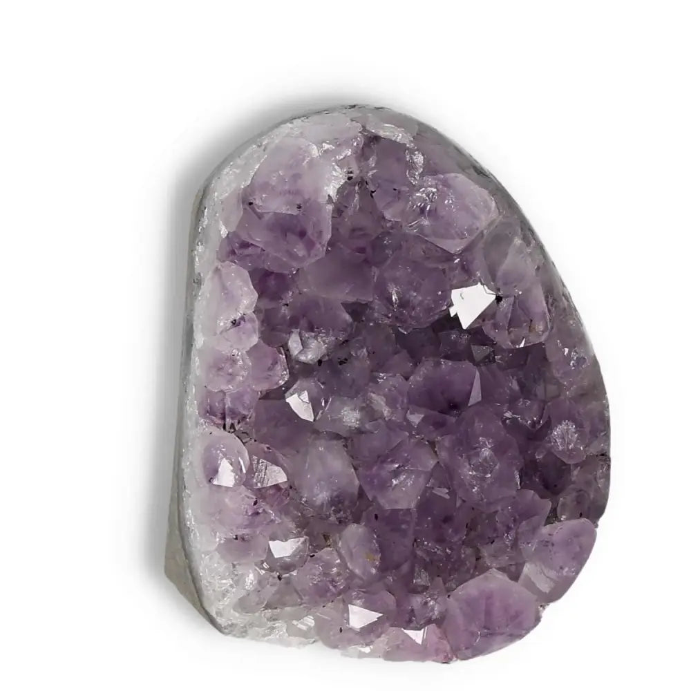 Amethyst cut base geode with rich purple hues and crystalline formations, showcasing Sylvia Crystals' commitment to quality.