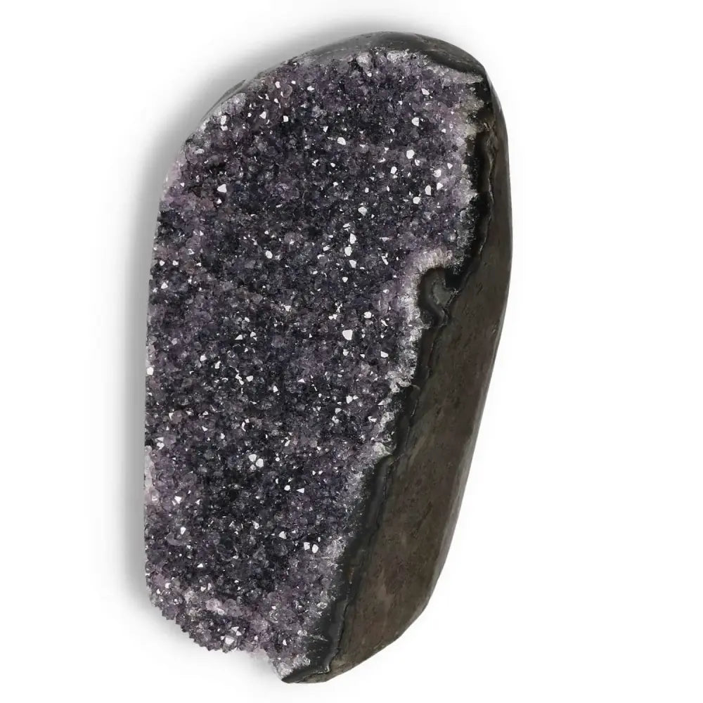 Amethyst cut base geode with sparkling deep purple crystals, enhancing spiritual elegance and beauty from Sylvia Crystals.