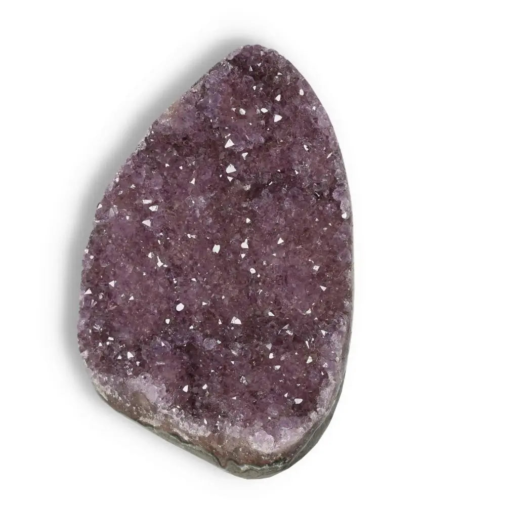 Sylvia Crystals amethyst cut base geode, showcasing deep purple crystals, a luxurious centerpiece with spiritual significance.