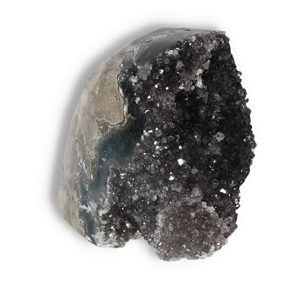 Amethyst cut base geode from Sylvia Crystals, enhancing spiritual well-being and reducing stress with exquisite craftsmanship.