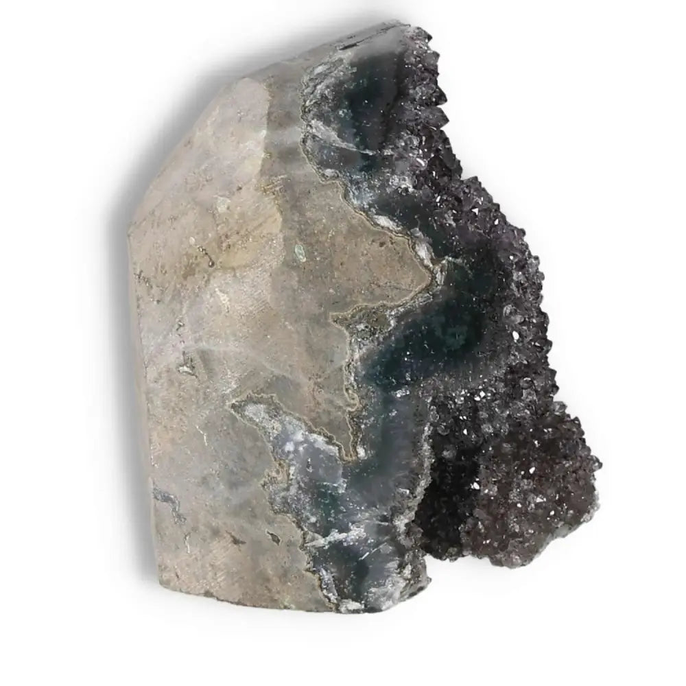 Amethyst cut base geode from Sylvia Crystals, enhancing aesthetics and well-being with stress reduction and concentration benefits.