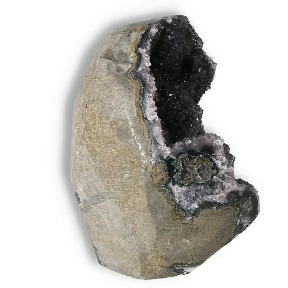 Amethyst cut base geode from Sylvia Crystals, designed to enhance spaces with style and spirituality, reducing stress and boosting energy.