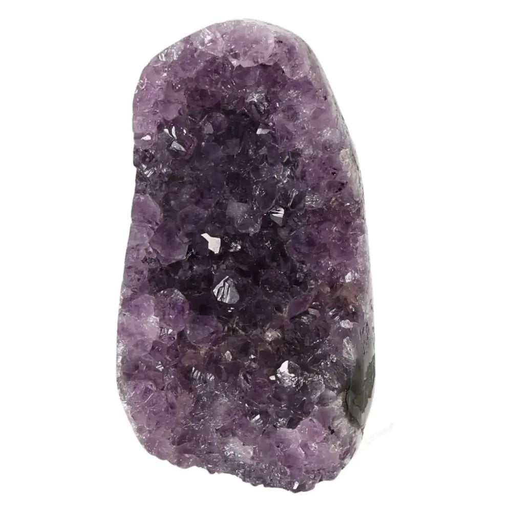 Luxurious Amethyst cut base geode from Sylvia Crystals, known for stress reduction and energy boost, showcasing emotional stability.