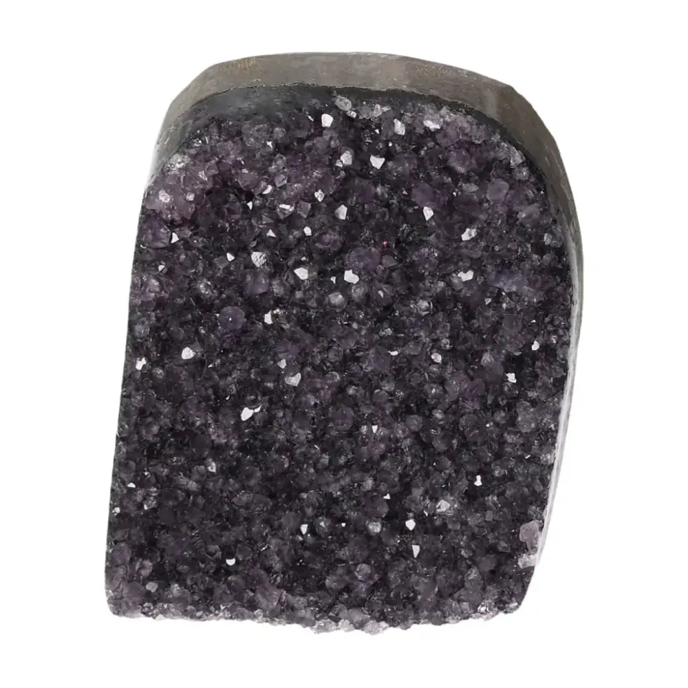 Amethyst cut base geode from Sylvia Crystals, enhancing decor with stress reduction and concentration benefits.