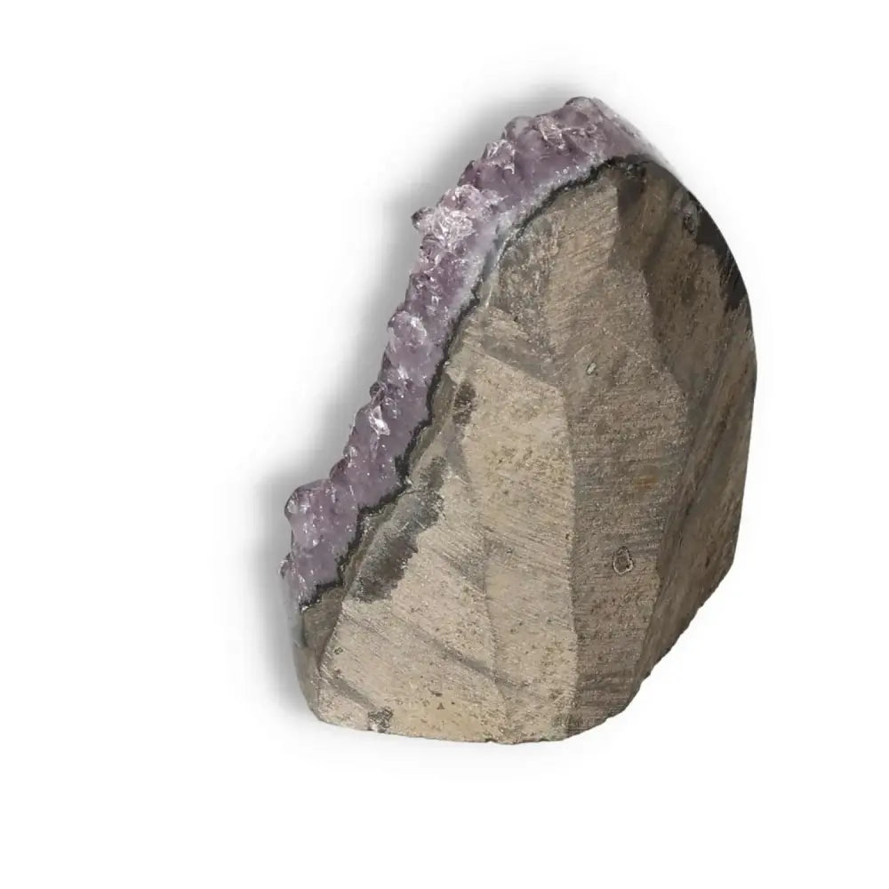 Amethyst cut base geode from Sylvia Crystals, showcasing deep purple tones and natural formations, exuding tranquility and positive energy.